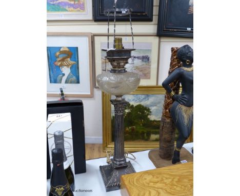   A silver plated oil Corinthian column lamp base, height overall 74cm