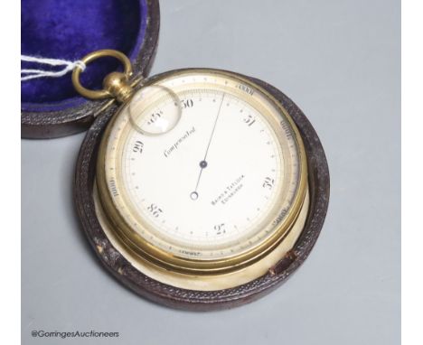   A cased pocket barometer