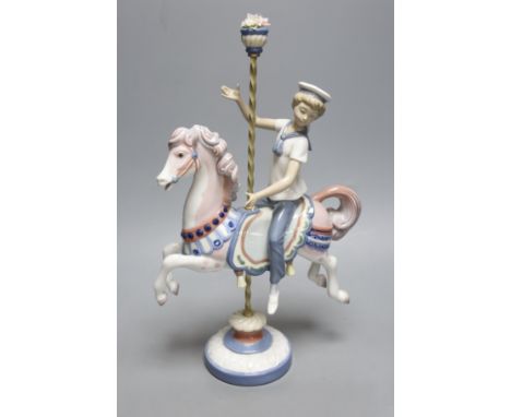   A Lladro figure, Boy on a Carousel Horse, height 39cmH 39cm 