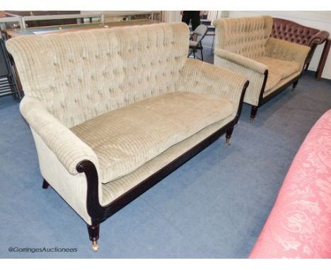   A pair of George IV style mahogany button back sofas, 181 cm wideProvenance - a country estate near Rye, Sussex
