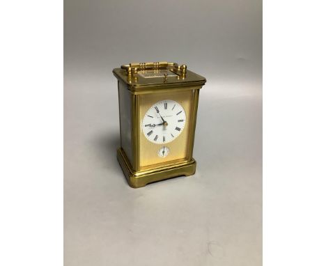   A Matthew Norman brass repeating carriage clock, serial number 1751, height 15cm
