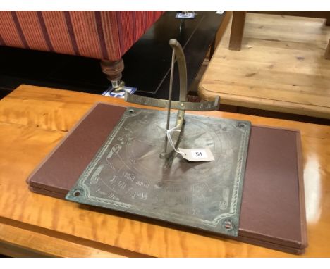   A 17th century style engraved brass sundial, width 30cm, depth 31cm, height 20cm