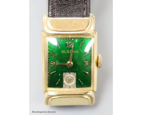   A gentleman's 1930's 10k gold filled Bulova manual wind wrist watch, with green enamel rectangular dial and subsidiary seco