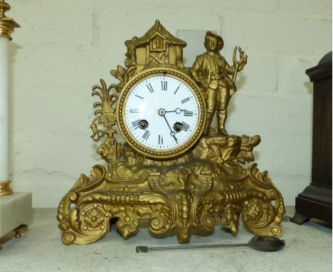 A 19th century gilt spelter mantel clock with 18th century figure, French striking drum movement