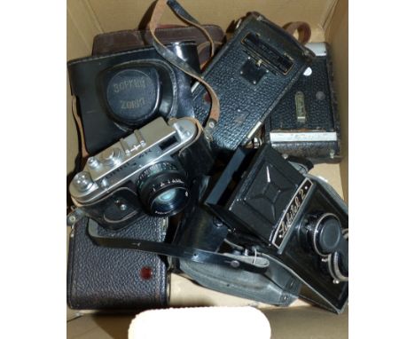 A Lubitel 2 box camera; 4 Kodak/Agfa folding cameras; a Zorki 35 ml camera