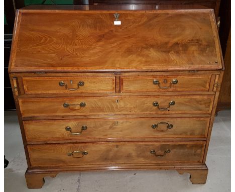 A GIII mahogany fall front bureau with satinwood crossbanding, inlaid fitted interior with secret compartments, 3 long and 2 