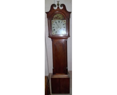 An early 19th century oak longcase clock with swan neck pediment and reeded columns to the hood, full length door to the trun