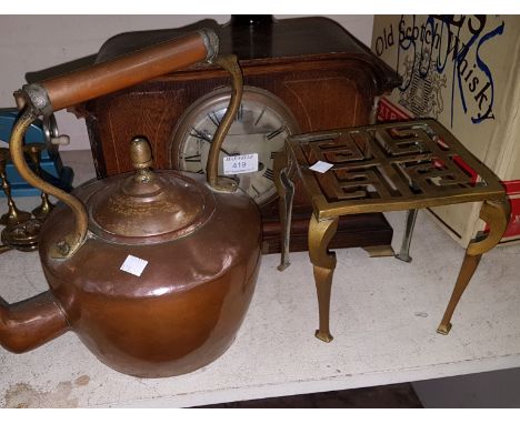 An Edwardian inlaid oak architectural mantel clock with chime; a copper kettle; a brass trivet; a carved wood jewellery box