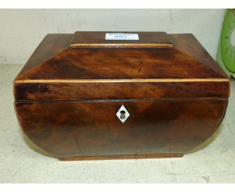 An early 19th century sarcophagus shaped tea caddy, boxwood bound mahogany, with 2 internal drawers