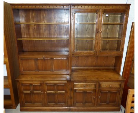 A pair of Ercol medium elm wall display units