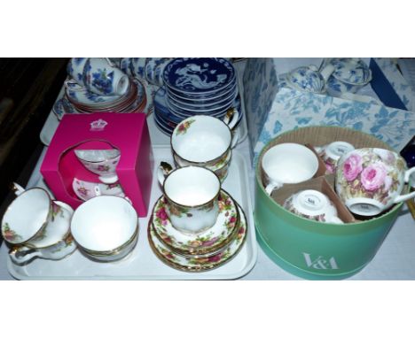 A Portmeirion "Botanic Blue" 7 piece tea set in original box; a set of 4 V&A cups and saucers in original box; 7 various Roya