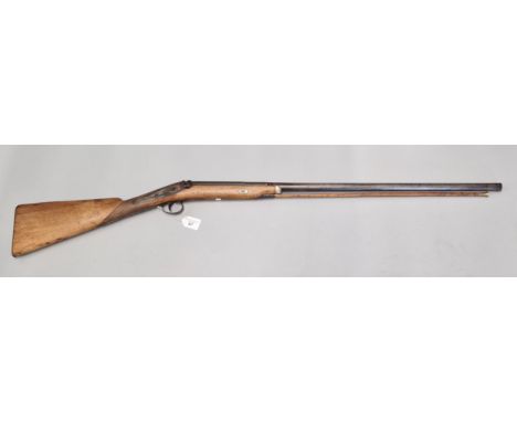19th century percussion muzzle loading sporting gun, the engraved action marked Clark, and having 78cm Damascus barrel. Lacks