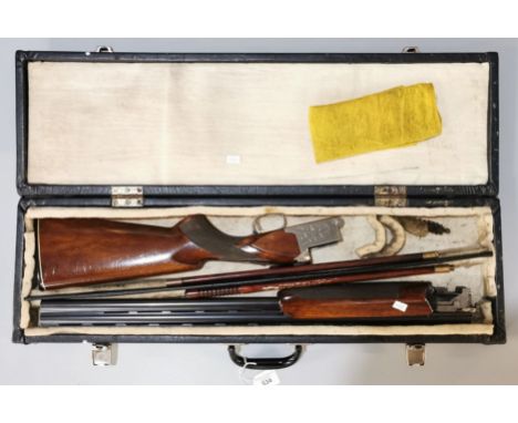 Nikko twelve bore over and under ejector Skeet shotgun, having twenty seven inch barrels with ventilated top rib, semi-pistol