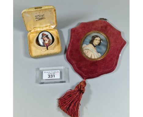 19th century porcelain oval portrait brooch, probably German, together with a 20th century portrait miniature of a young girl