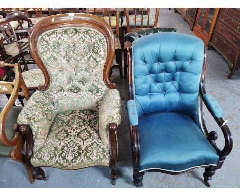 Victorian mahogany button back fireside armchair, together with another Victorian upholstered button back walnut framed fires
