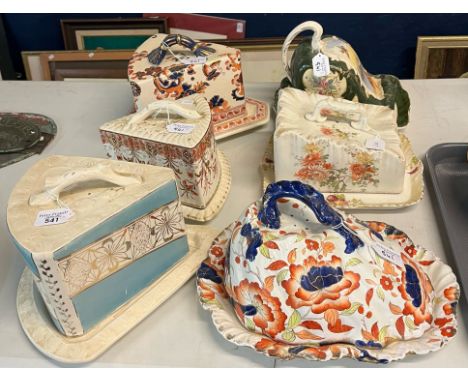A Royal semi-porcelain Imari design printed and painted pottery cheese dish and cover, 29cm long approx. An early 20th centur