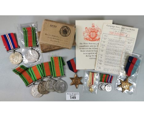 Collection of unnamed WWII medals to include: Five (5) Defence Medals, two (2) 1939-45 Starts, War Medal 1939-45, three (3) m