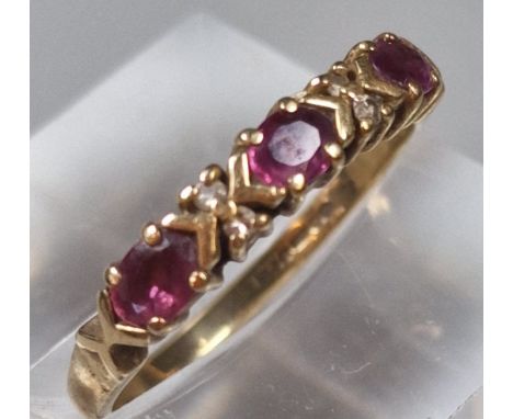 9ct gold ruby and diamond stone dress ring. 1.7g approx. Size L1/2. (B.P. 21% + VAT)