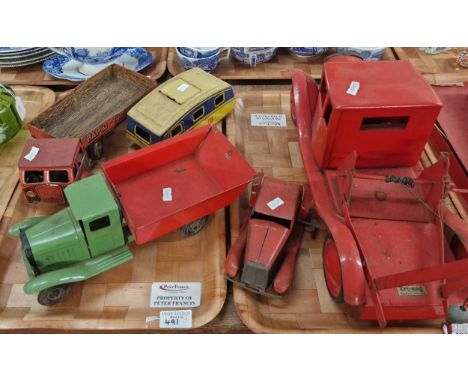 Collection of tinplate toys to include: Tri-ang tow stuck, Rapid-transport lorry, caravan, another Tri-ang truck etc. (B.P. 2