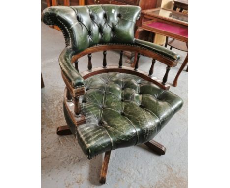 Reproduction green leather button back swivel office chair. (B.P. 21% + VAT)
