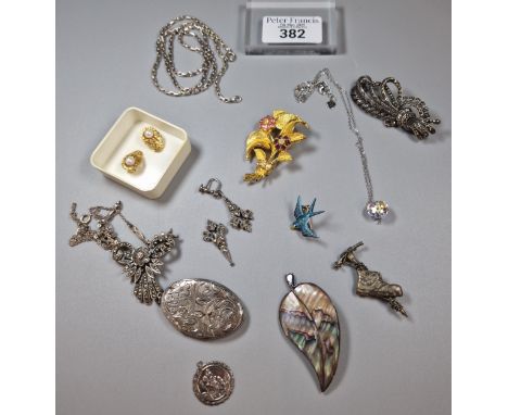 Small box of jewellery to include: pair of 9ct gold and pearl clip-on earrings. 4.3g approx. Silver engraved locket, swallow 