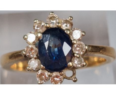18ct gold diamond and sapphire ring, missing one diamond stone. 6.7g approx. Size S. (B.P. 21% + VAT)Diameter of diamond - 0.