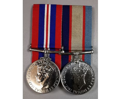 Two WWII British Medal pair, awarded to "W17153 P.L. NORMAN". *War Medal 1939-45 (W17153 P.L. NORMAN). *Australia Service Med