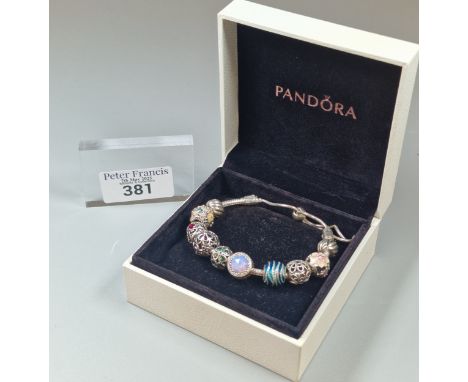 Pandora silver and enamel charm bracelet, in original box. (B.P. 21% + VAT)