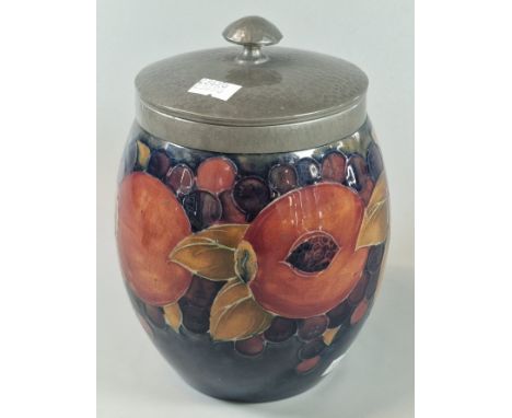 Moorcroft Pottery tube-line 'Pomegranate' biscuit barrel with pewter lid, pewter cover and rim. Impressed marks Tudric Moorcr