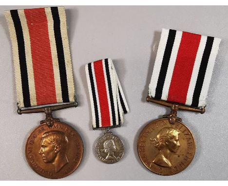 Two Special Constabulary Long Service Medals, together with matching (ER II) miniature. George VI Medal (James G. Ritchie), E