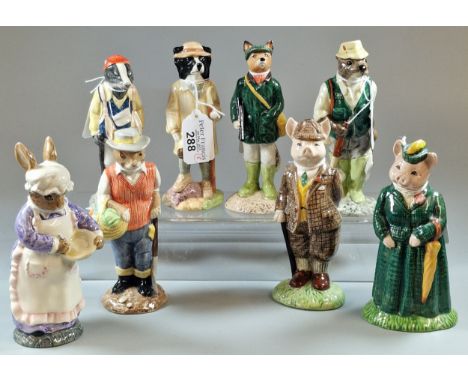 Collection of eight Beswick satirical animal figures to include: Huntsman Fox, Gardener Rabbit, The Lady Pig, Gentleman Pig, 