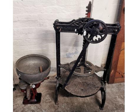 An S. Kelly cast iron cheese press, together with a  Lister traditional butter making cream separator. (2) (B.P. 21% + VAT)