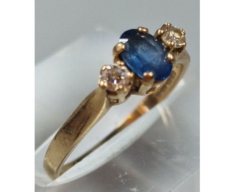 9ct gold three stone diamond and sapphire dress ring. 1.6g approx. Size L. (B.P. 21% + VAT)