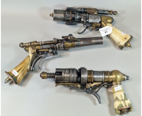 Three unique custom made steampunk style pistols, with bronze, steel components and bone handles. Created by a former retired