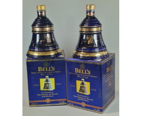Two Wade Bell's Extra Special Old Scotch Whisky decanters, both to celebrate The Prince Of Wales 50th Birthday. In original b