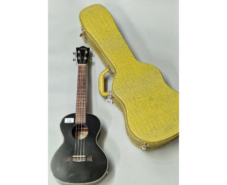 Lanikai four sting electric Ukulele, the label marked to the interior Lenikai Ukeleles Hawaii, Model No. LU2. In simulated cr