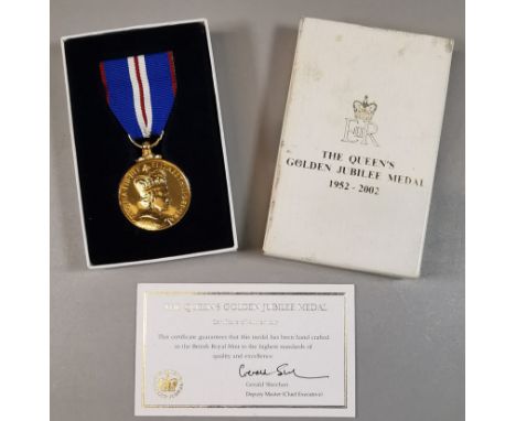 The Queen's Golden Jubilee Medal (1952 - 2002), in box with COA. Gold plated cupronickel. (B.P. 21% + VAT)
