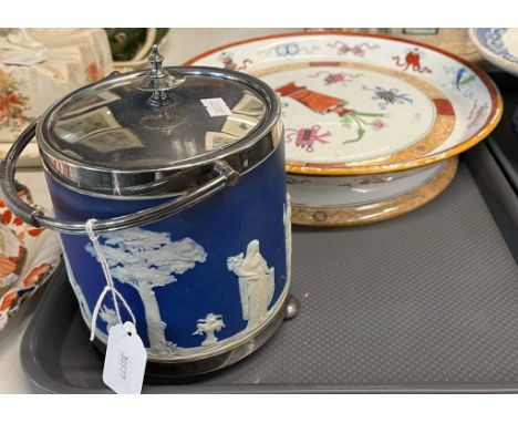 A Wedgwood dark blue biscuit barrel and cover with plated mounts, a Royal Worcester porcelaneous transfer printed tureen and 