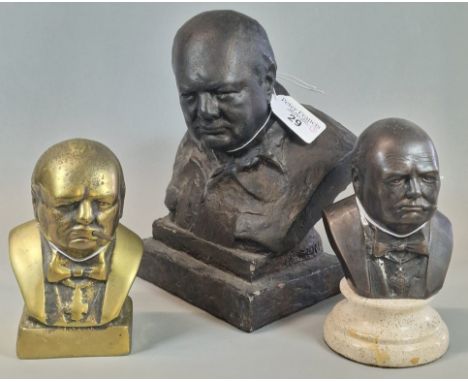 Two bronzed busts of Winston Churchill, together with a heavy cast brass/bronze bust of Winston Churchill. (3)  (B.P. 21% + V