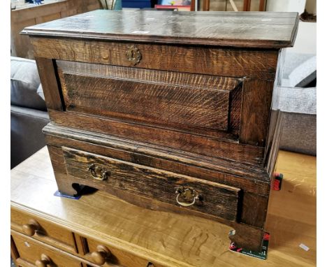 18th century style oak coffwr bach, the hinged moulded lid above rectangular fielded panel, projecting base with single drawe