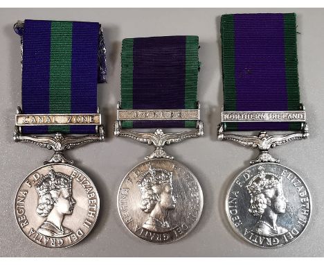 Three Queen Elizabeth II General Service Medals. *Canal Zone Clasp Medal, awarded to: "2291185 GNR R J HALL R.A". *Borneo Cla