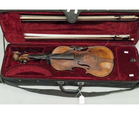 Vintage Stradivarius copy violin, with one piece back. In modern fitted case with two bows.  (B.P. 21% + VAT) Heavily worn an