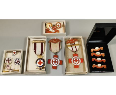 Collection of British Red Cross Medals, Badges and Pins, to include: British Red Cross Society Medal , marked '16564 W. Olive
