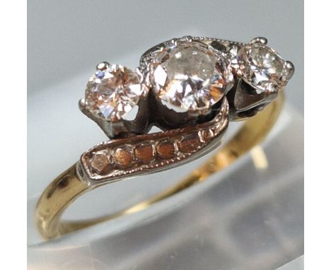 18ct gold and platinum diamond three stone ring. 3g approx. Size K1/2. (B.P. 21% + VAT)Diamond is a bit cloudy, with some ver