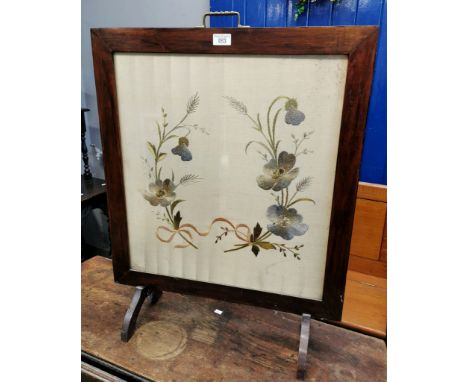Early 20th century mahogany framed tapestry fire screen with silk panels of flowers and foliage. (B.P. 21% + VAT)