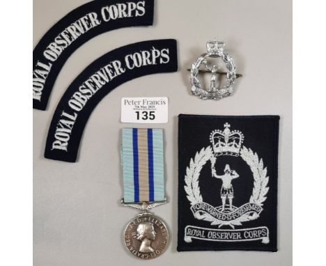 Royal Observer Corps Medal awarded to Observer P.W. McLoughlin, with patches and cap badge. Elizabeth II (C) type medal (lack