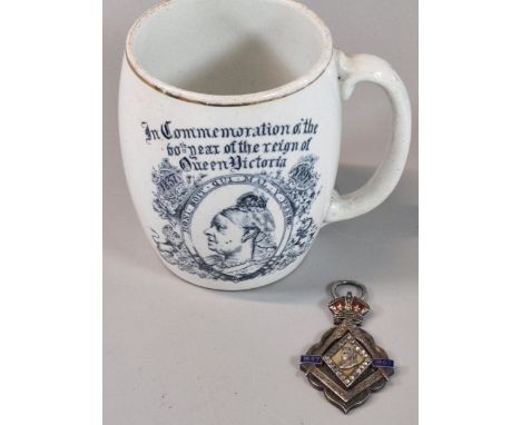 Queen Victoria masonic jewel 1837-1897, together with a commemorative mug celebrating the reign of Queen Victoria (marked 'CT