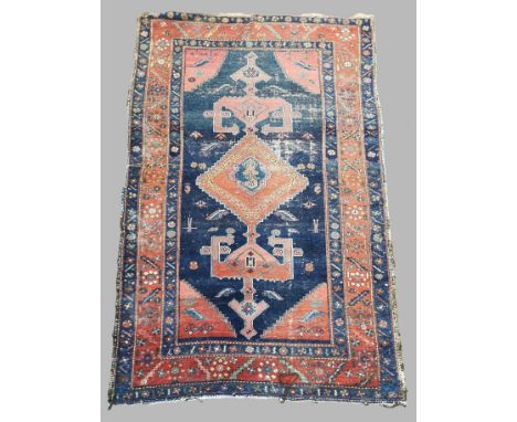 Vintage Persian Hamadan rug, on a blue ground with central lozenge medallion and repeating floral and foliate borders. 190x12
