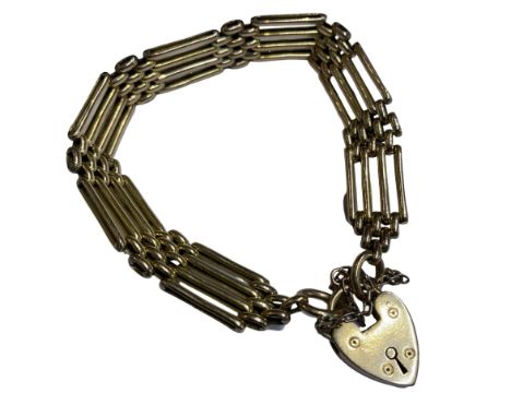 An Edwardian 15ct gold four bar gate bracelet with padlock, approx. 19.8 grams, London 1907
The padlock fully hallmarked, eac