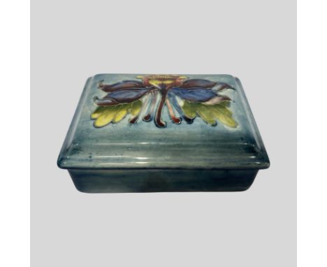 Moorcroft Columbine trinket box Hibiscus pattern. Dimensions: 12 x 9 cms. Impress marks, labels, etc to base (see pictures). 